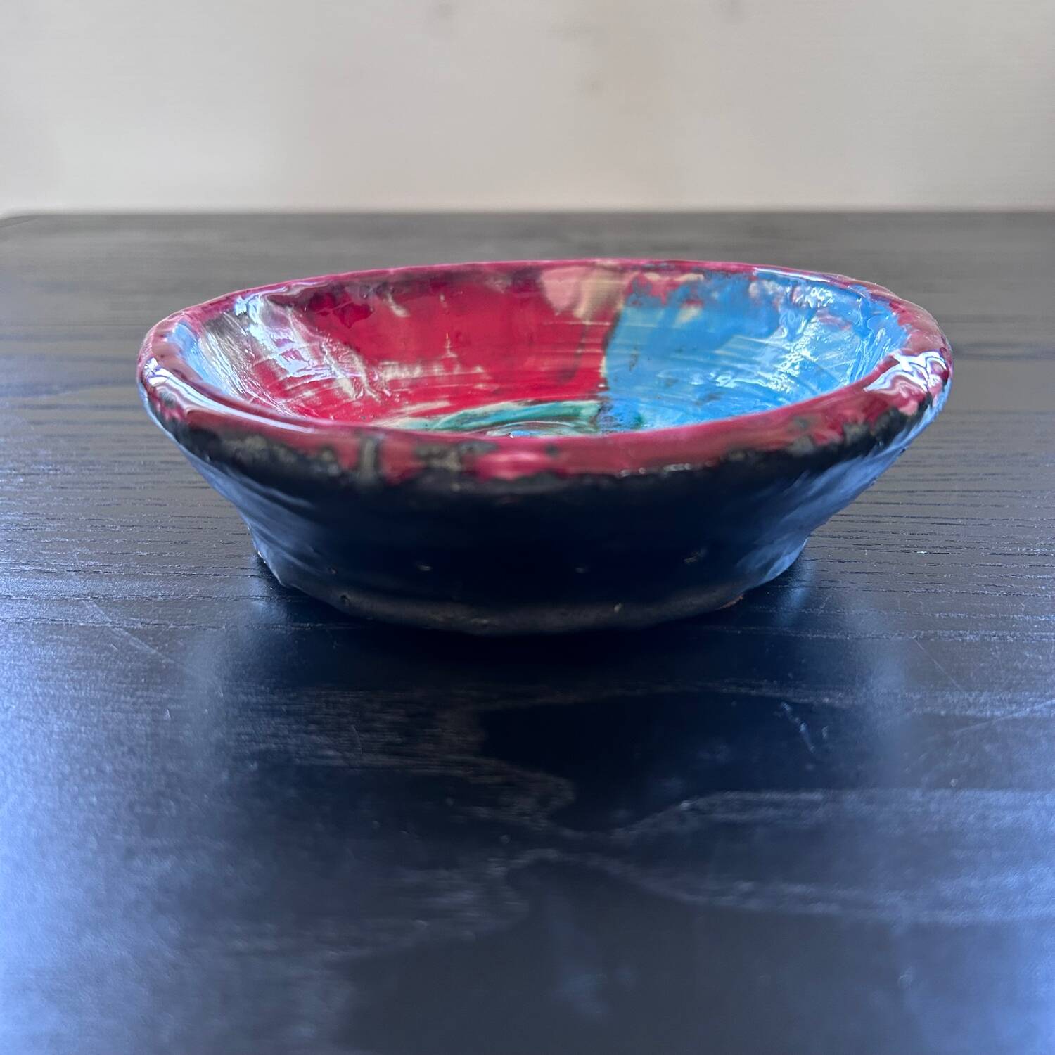 Multicolored artist's pocket emptier