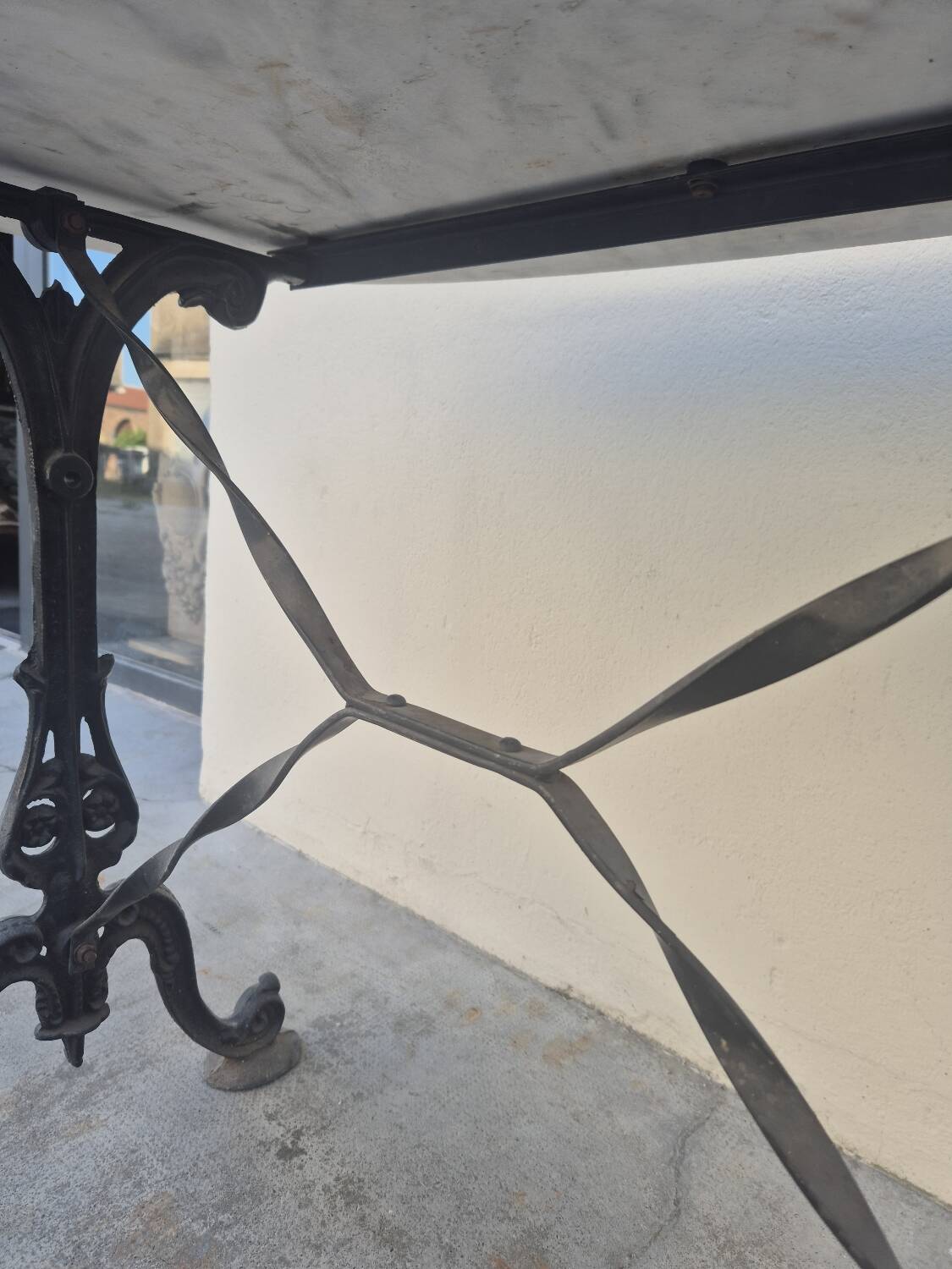 Antique cast iron and marble bistro restaurant table