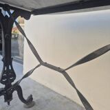 Antique cast iron and marble bistro restaurant table