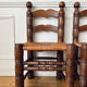 Pair of rustic chairs in the style of Charles Dudouyt.