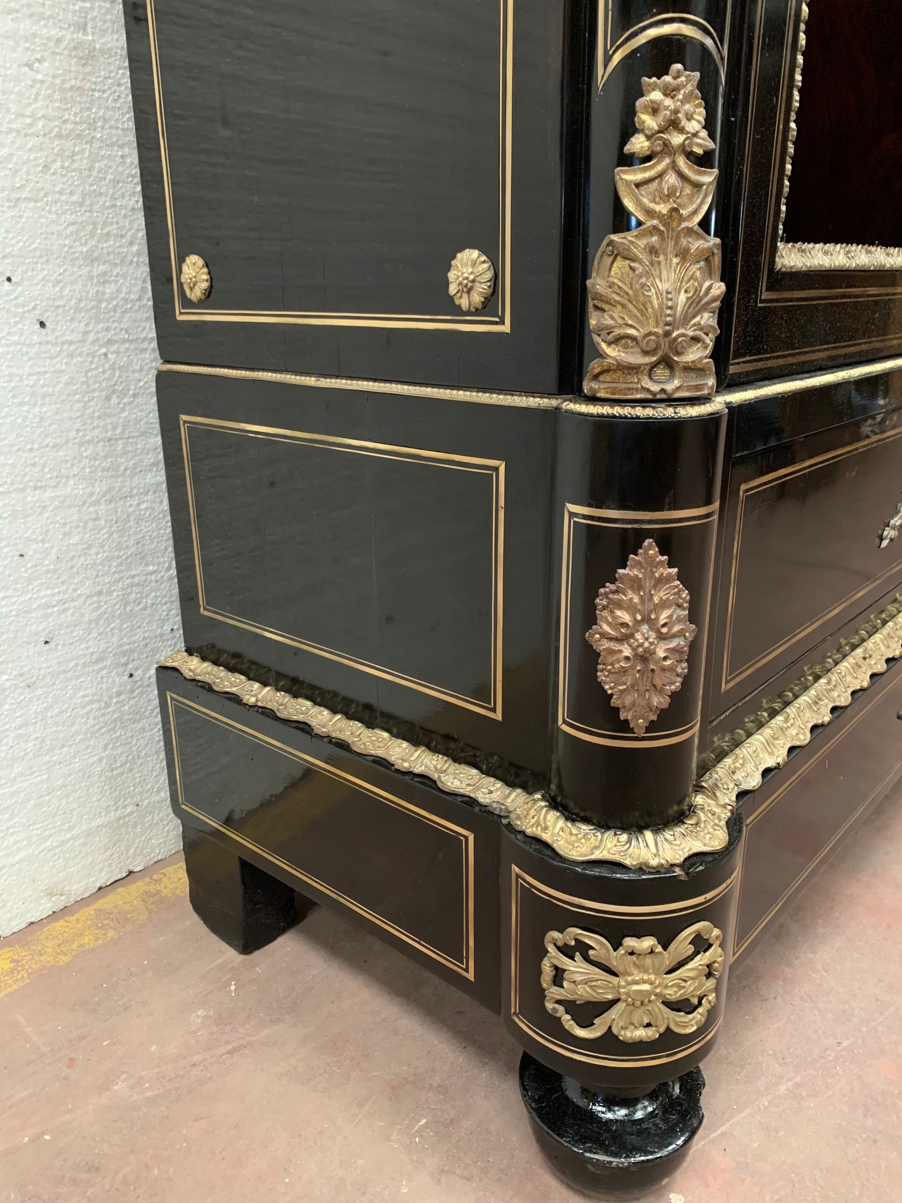 Napoleon III ceremonial showcase in black wood and gilded chiseled bronze XIX century