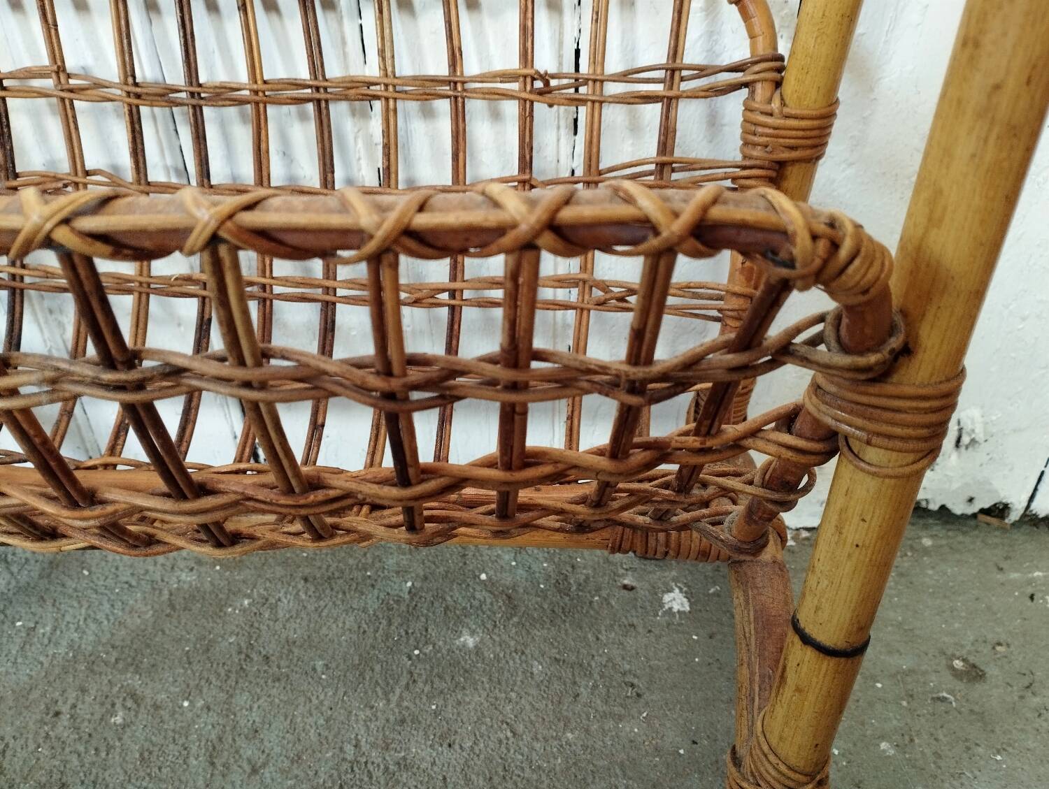 Vintage rattan and bamboo magazine rack