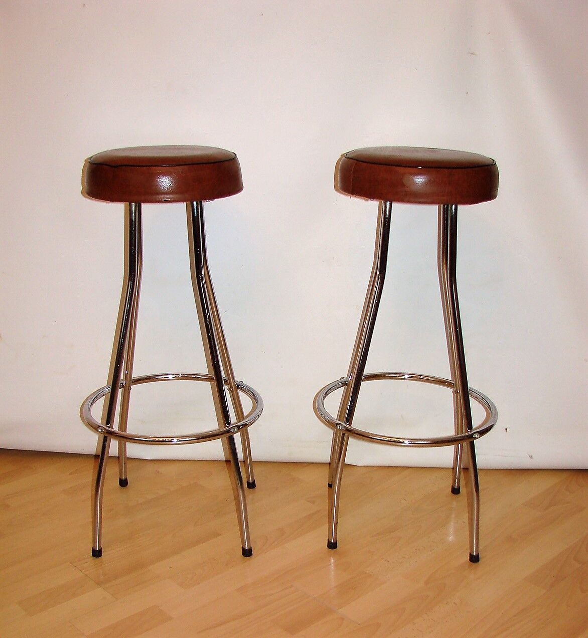 Pair of hockers, bar chairs 70s