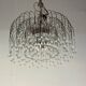 Pair of large chandeliers adorned with glass drops, chrome metal structures, Italy circa 1960.