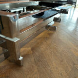 70s design coffee table in rectangular glass with chrome legs.