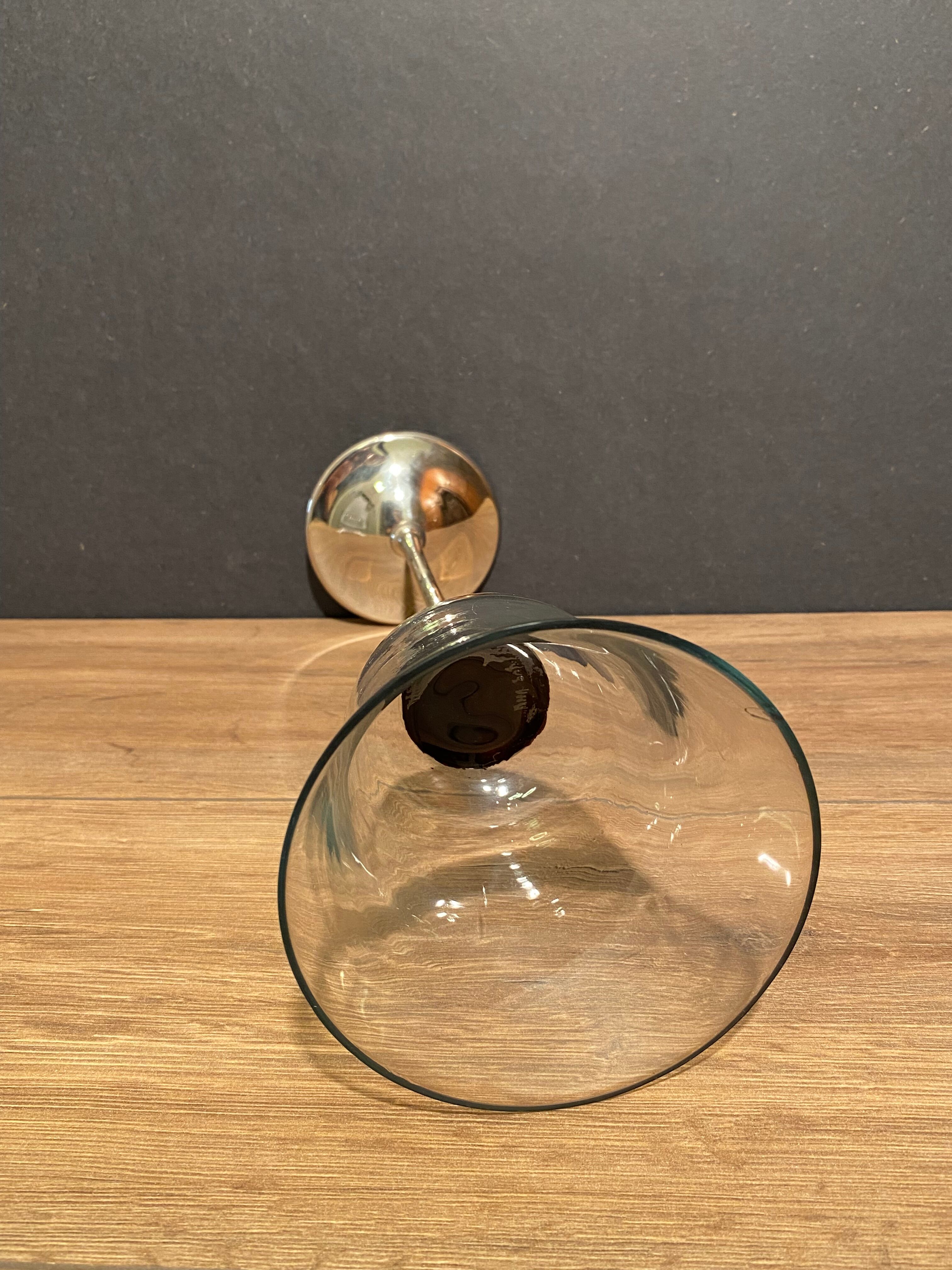 Glass photophore on high metal stand with silver patina