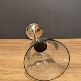 Glass photophore on high metal stand with silver patina