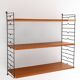 Scandinavian Hylla teak wall shelf with brass label