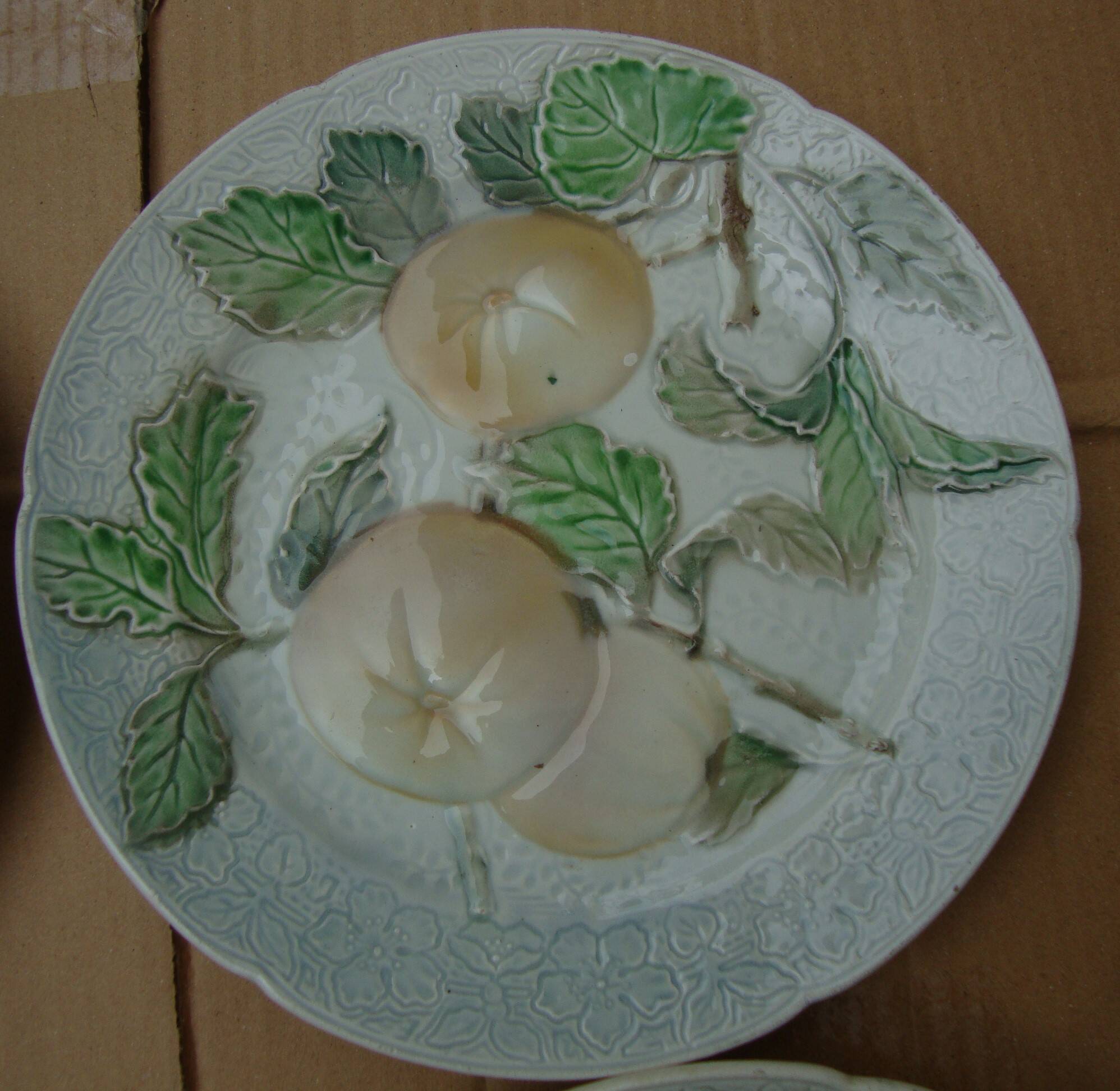 Set of 4 Keller and Guerin St Clement Majolica plates with fruit decoration.