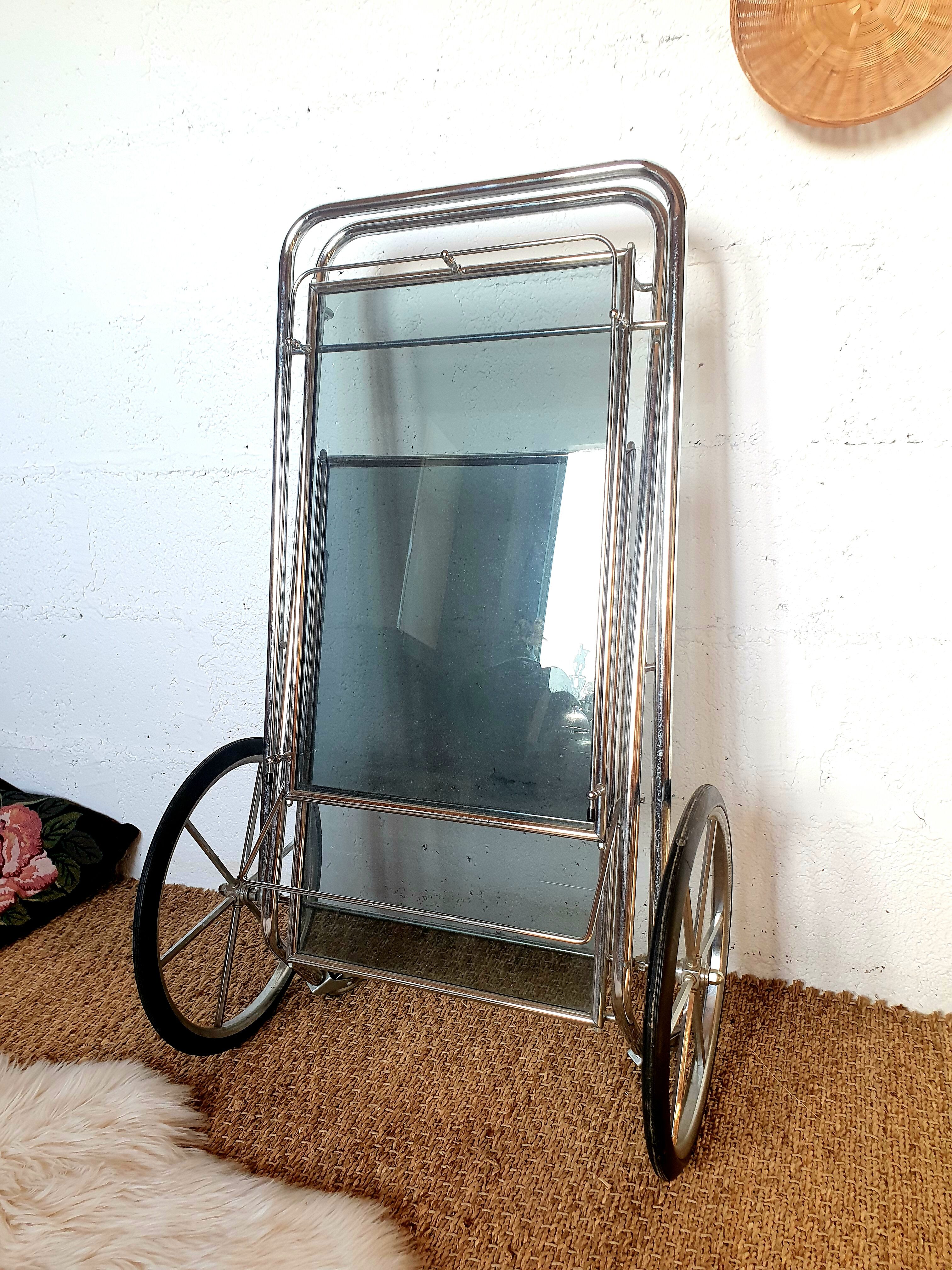 Rolling dessert / chrome bar and smoked glass