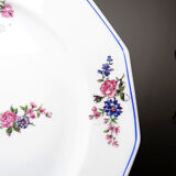4 flat plates by Bernardaud, Limoges porcelain, floral decoration from the 1920s to 1950s.