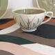 Tea cup by Susie Cooper hand painted