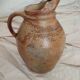 Old farm jug in glazed stoneware