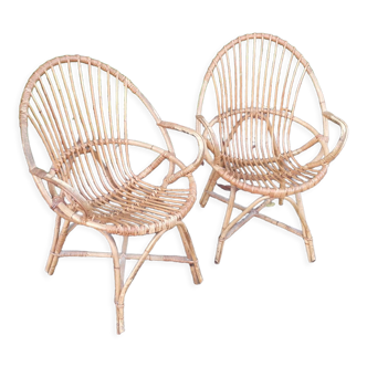 Pairs of rattan armchairs with armrests year 50 vintage