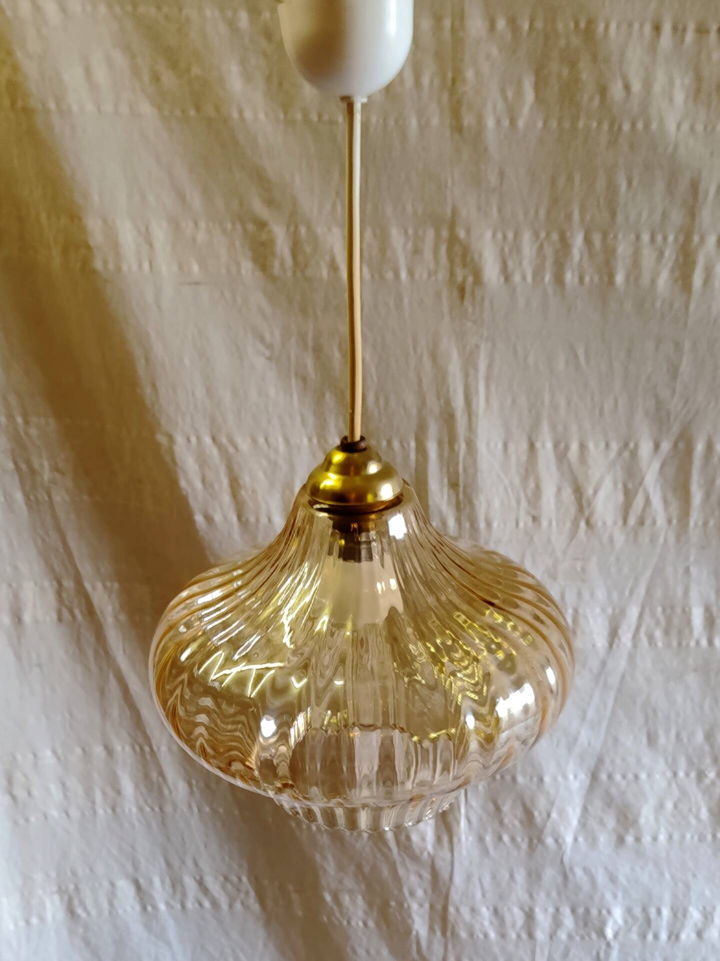 70's amber glass suspension design