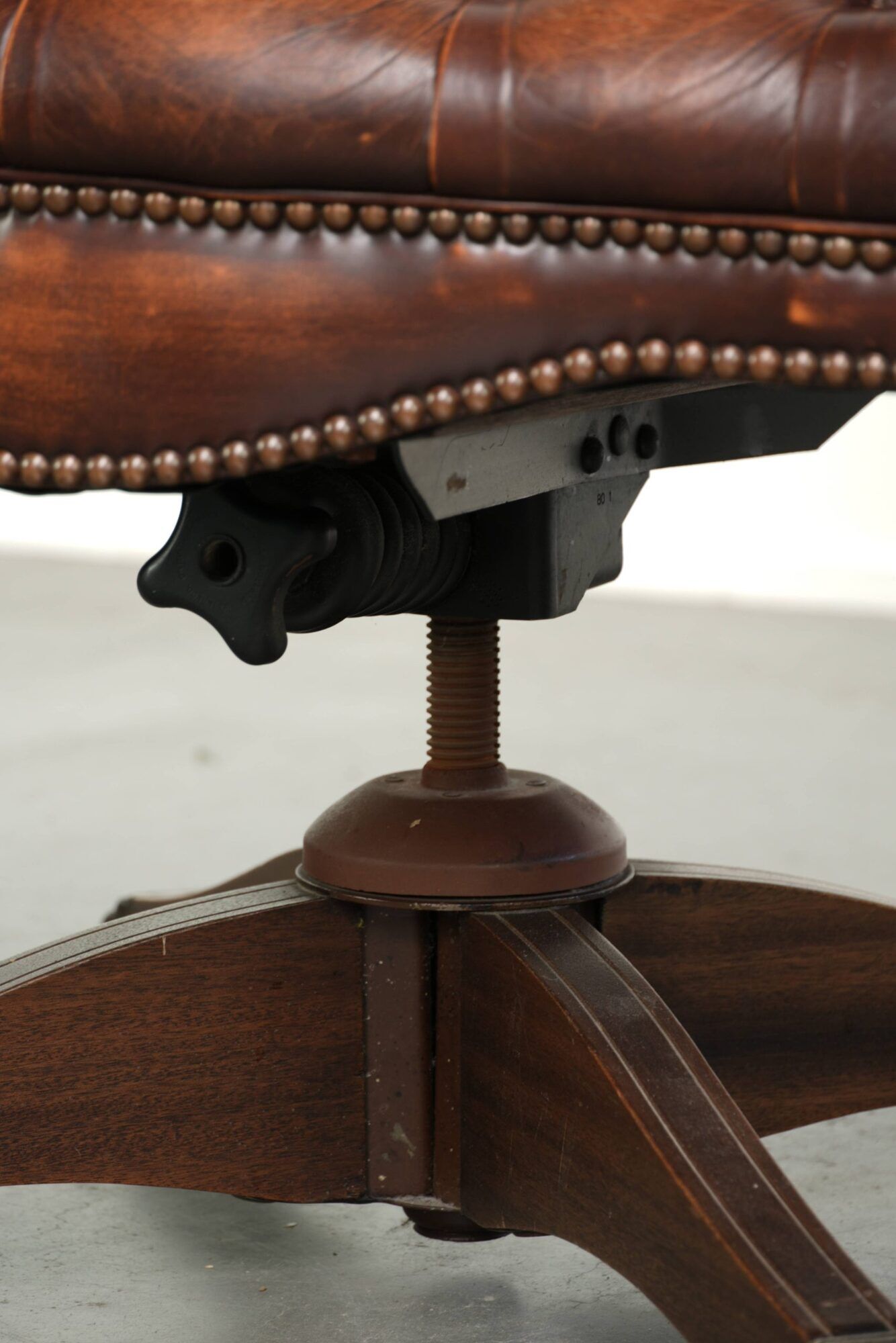 English cowhide Chesterfield swivel and tilt button seat office chair