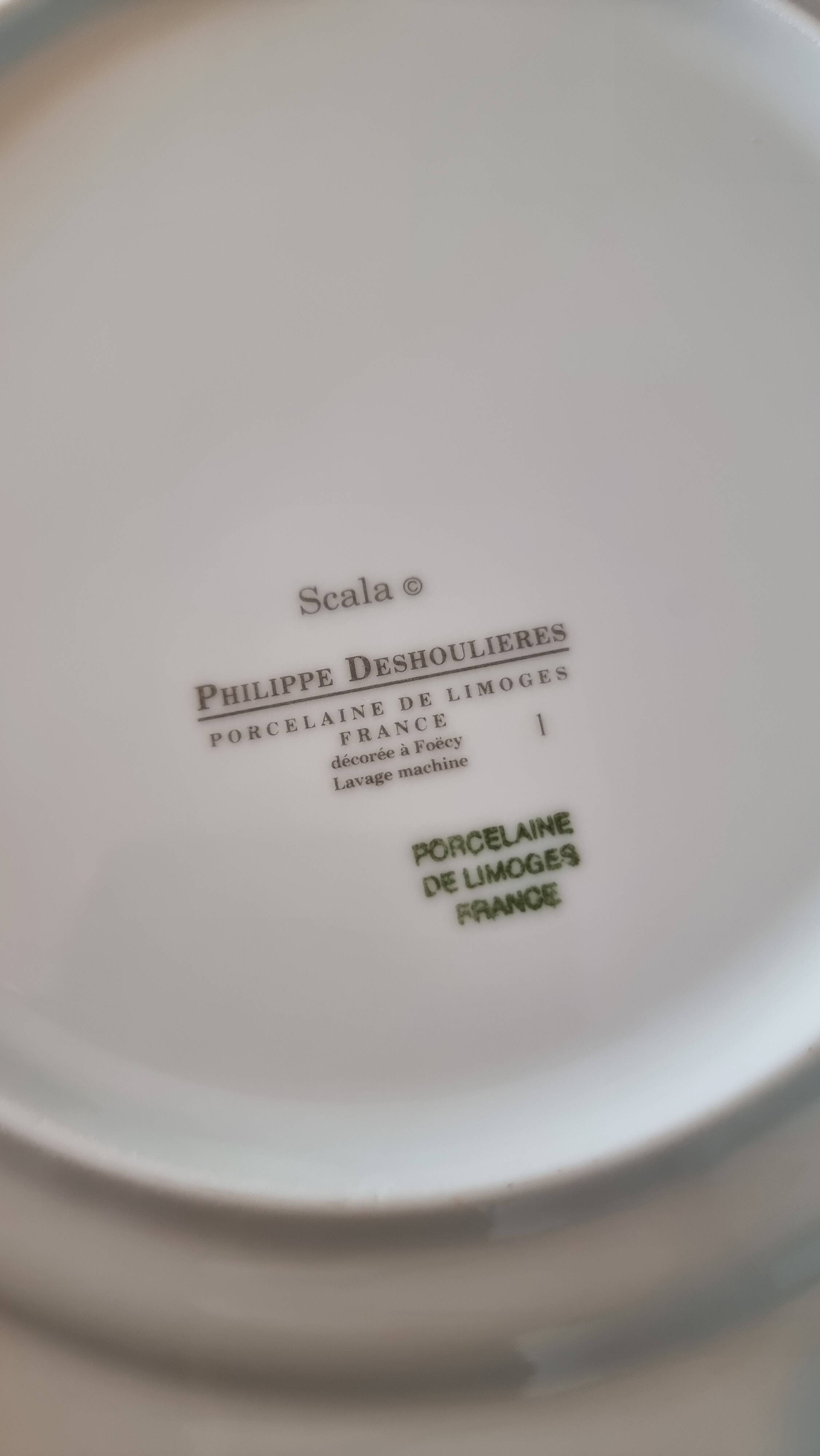 18-piece porcelain dinnerware set from Limoges by Philippe Deshoulières.