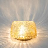 Pairs of amber glass wall lights in the shape of a fingerprint, Germany, 1970s.