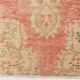 Tapis vintage oriental rouge et saumon