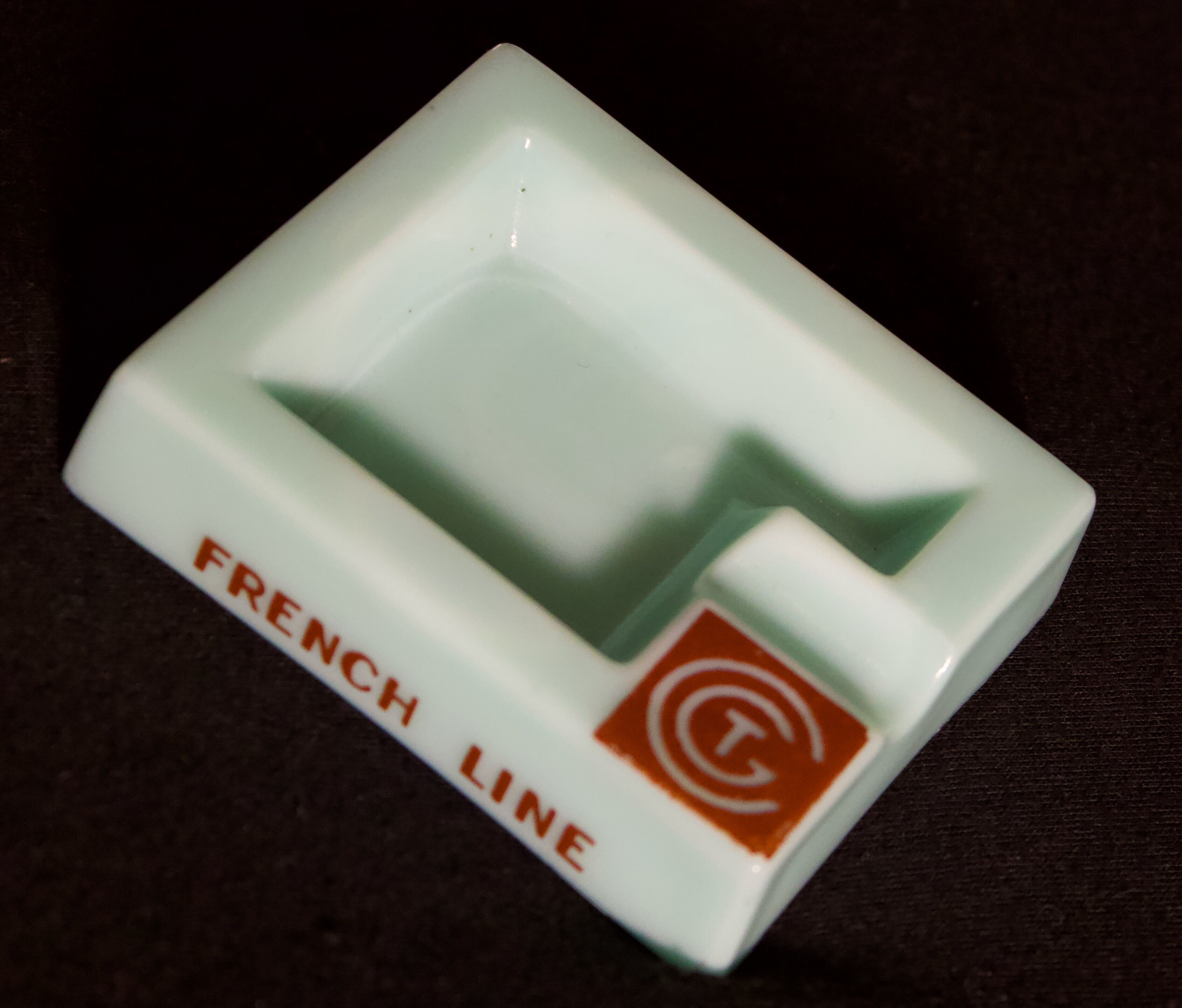 Three opalex ashtrays at the Logo of the Trans-Atlantic General Company - French Line - Model created by Jean Luce for the cruises of the liner Normandy and France