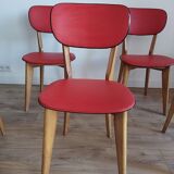 6 red and wood skai chairs
