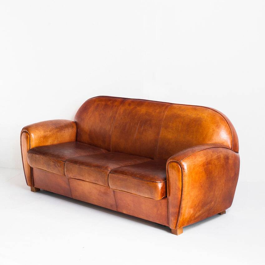 Vintage leather club sofa. Art Deco style. France, 1950s. (sofa convertible into bed)