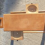 Magazine rack with sliding drawers in light wood, Scandinavian style.