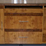 Walnut Burr buffet with drawers and wheels, part of a set.