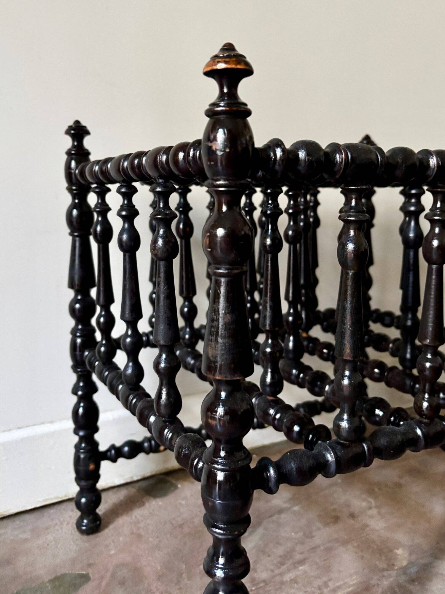Napoleon III magazine rack in black turned wood