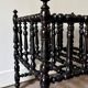 Napoleon III magazine rack in black turned wood