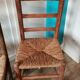 St of 2 raw wood and straw chairs