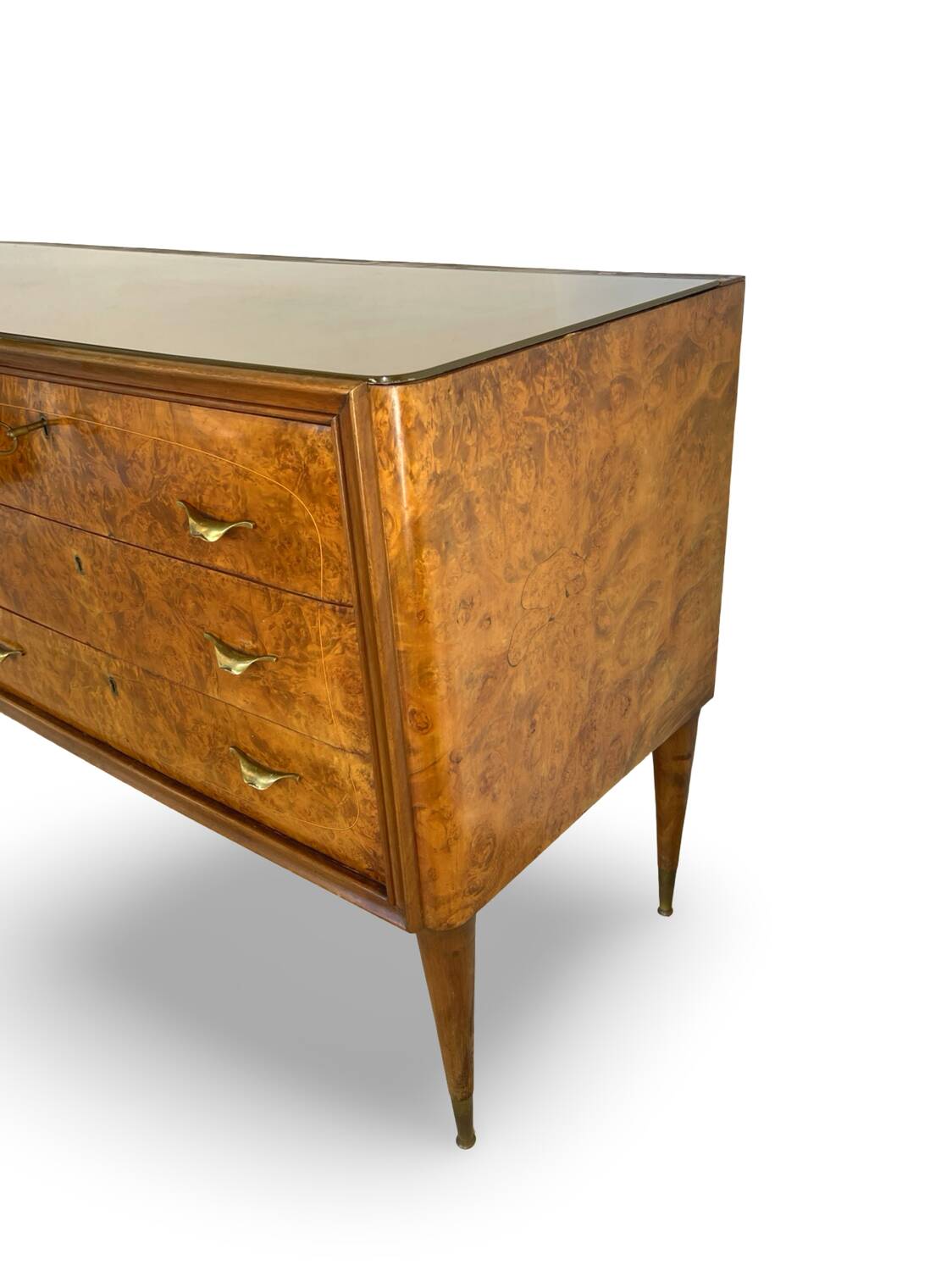 Veneered burl walnut chest of drawers with light warm brown glass top
