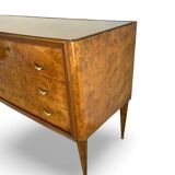 Veneered burl walnut chest of drawers with light warm brown glass top