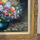Framed bouquet of flowers, oil on canvas signed R Mogisse.