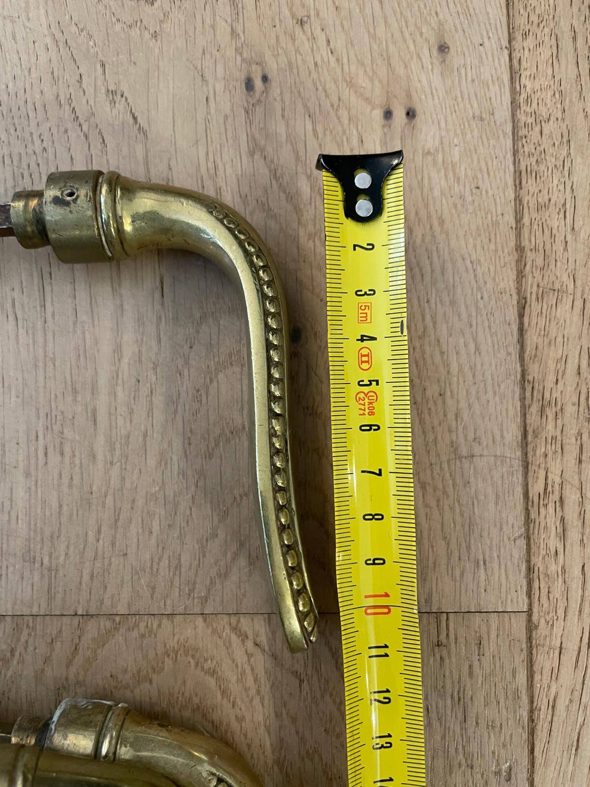 Set of 7 solid brass door handles