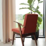 Vintage orange curly papaya armchair 1970