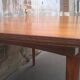 Extendable teak dining table