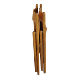 Pair of vintage wooden folding chairs with star pattern on seat