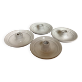 Four ceramic candle holders