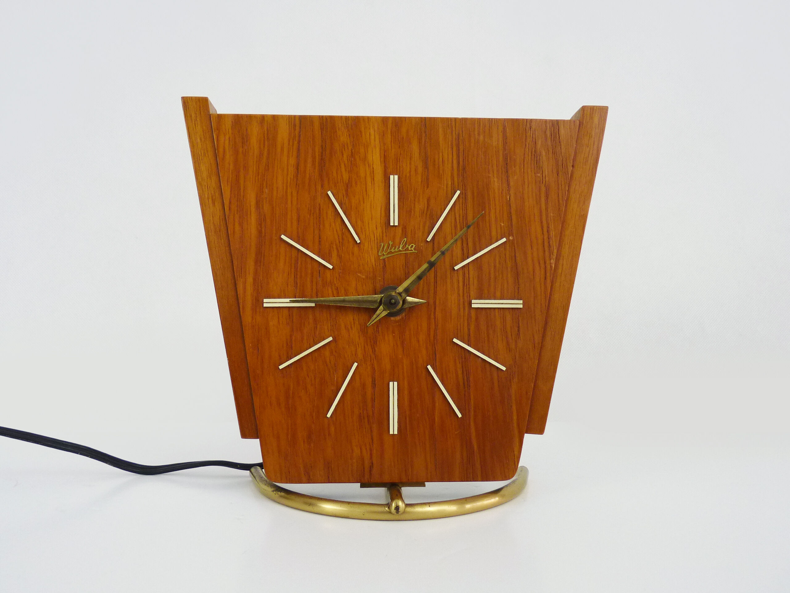 Table clock, art deco clock in Wuba Amsterdam in wood and brass. Year 50