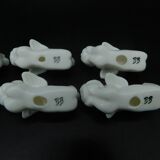 8 porcelain knife rests - Cherubs