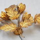 Paire d'appliques murales fleur feuillage en métal doré par Hans Kögl, 1970