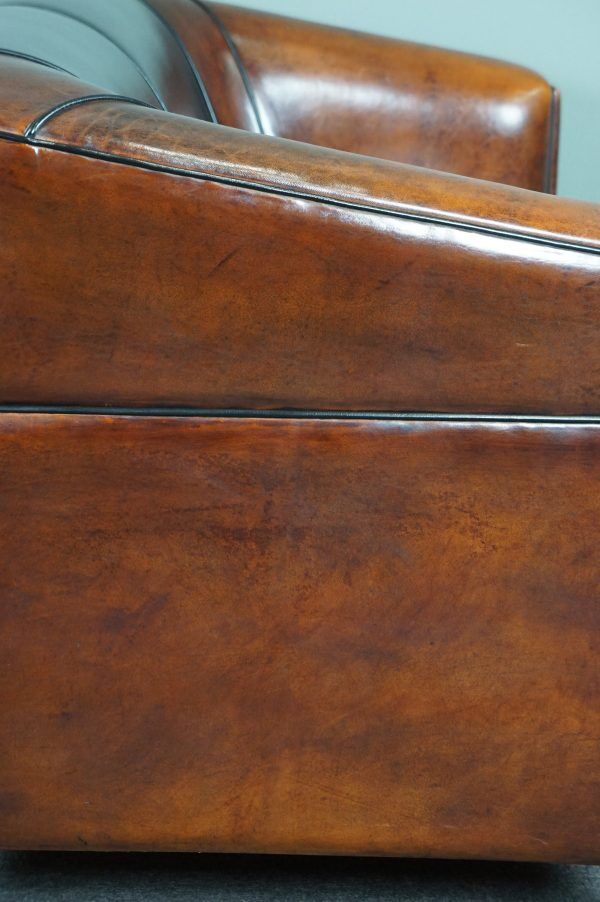 2.5-seater art deco style sofa in sheepskin
