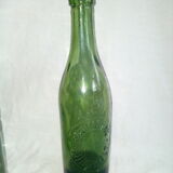 Set of three old bottles of green moulded glass