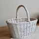 Vintage wicker basket painted white
