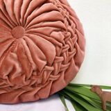Round orange velvet cushion