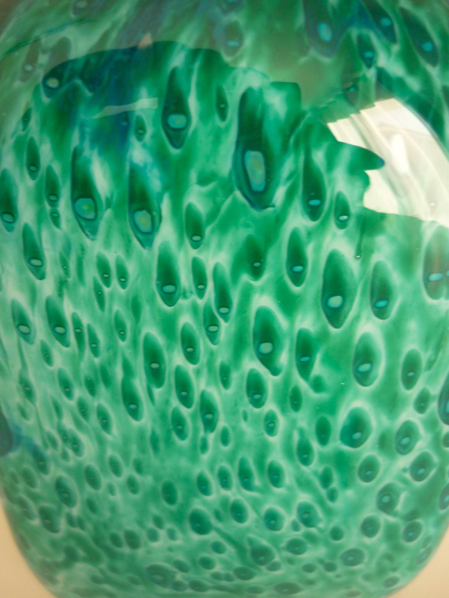 White multi-layer blown glass bottle vase with blue and green inclusions