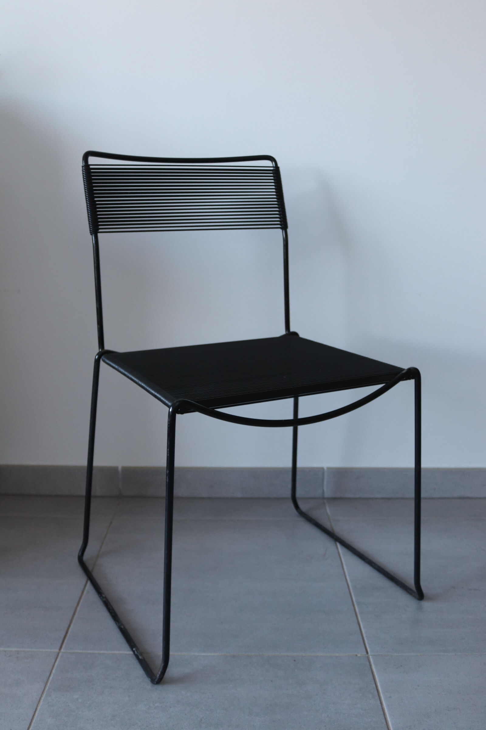 Black chair Spaghetti Giandomenico Belotti for fly line