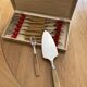 12 pie forks and 1 shovel