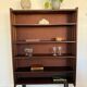 Vintage veneer bookcase with metal legs
